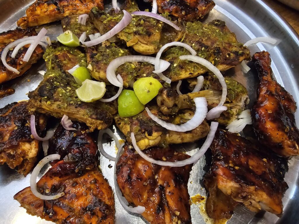 A heavy pot filled with sliced onions softening in fat over a low flame