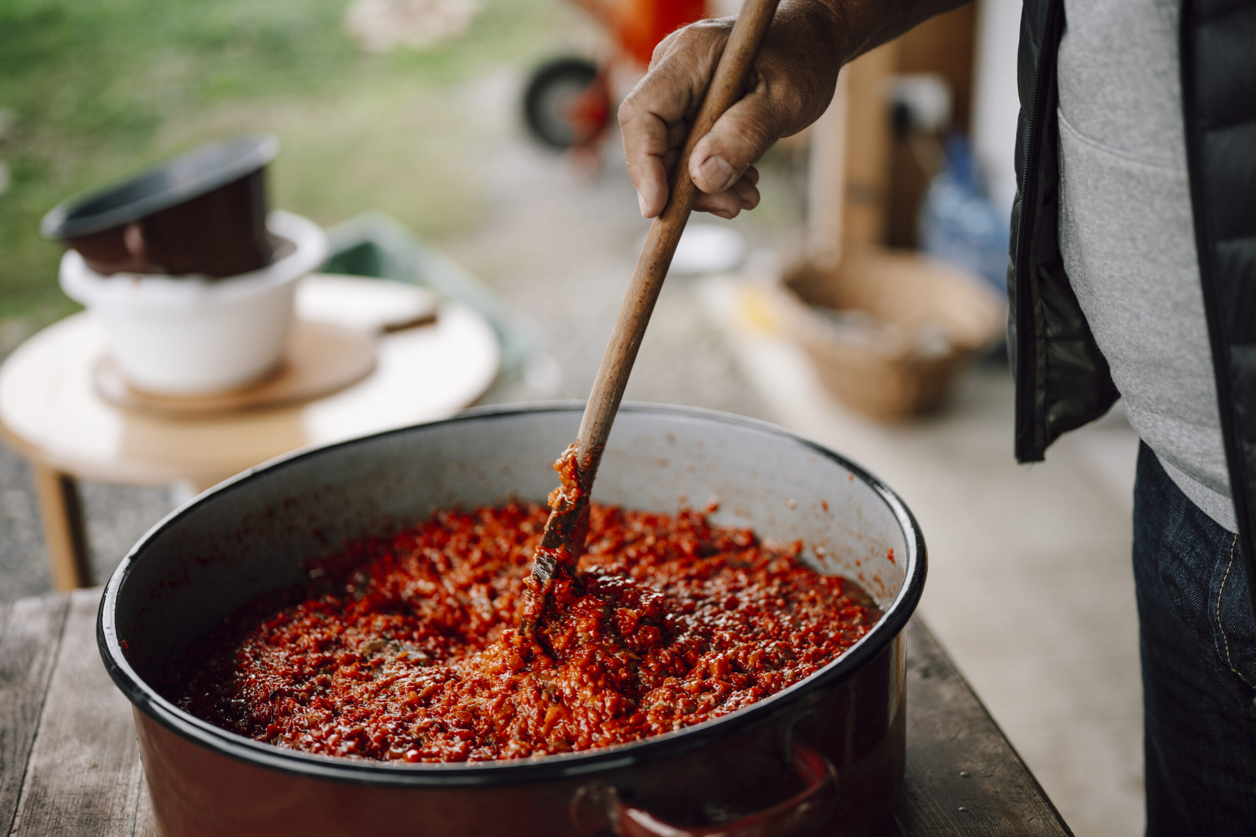 The sausage goes in late, and the pot runs until dinner